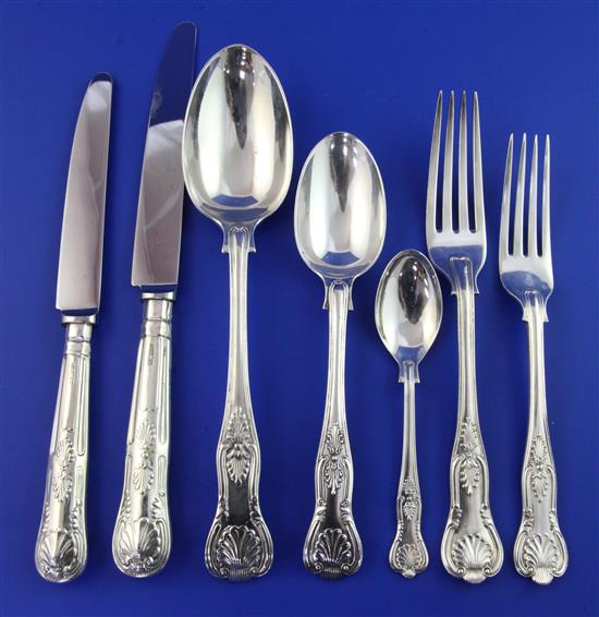 A late Victorian and later matched suite of silver Kings pattern cutlery for twelve,